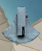 Wildride toddler carrier in denim stripe. A 100% cotton seat stylish hip carrier for babies in thin blue and white stripes 