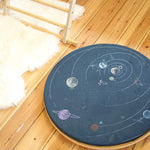 Close up of the Wobbel 360 eco-friendly deck and pillow cushion accessories on a Wobbel balance board on a wooden floor