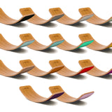 Full range of Wobbel Bamboo balance boards laid out on a white background