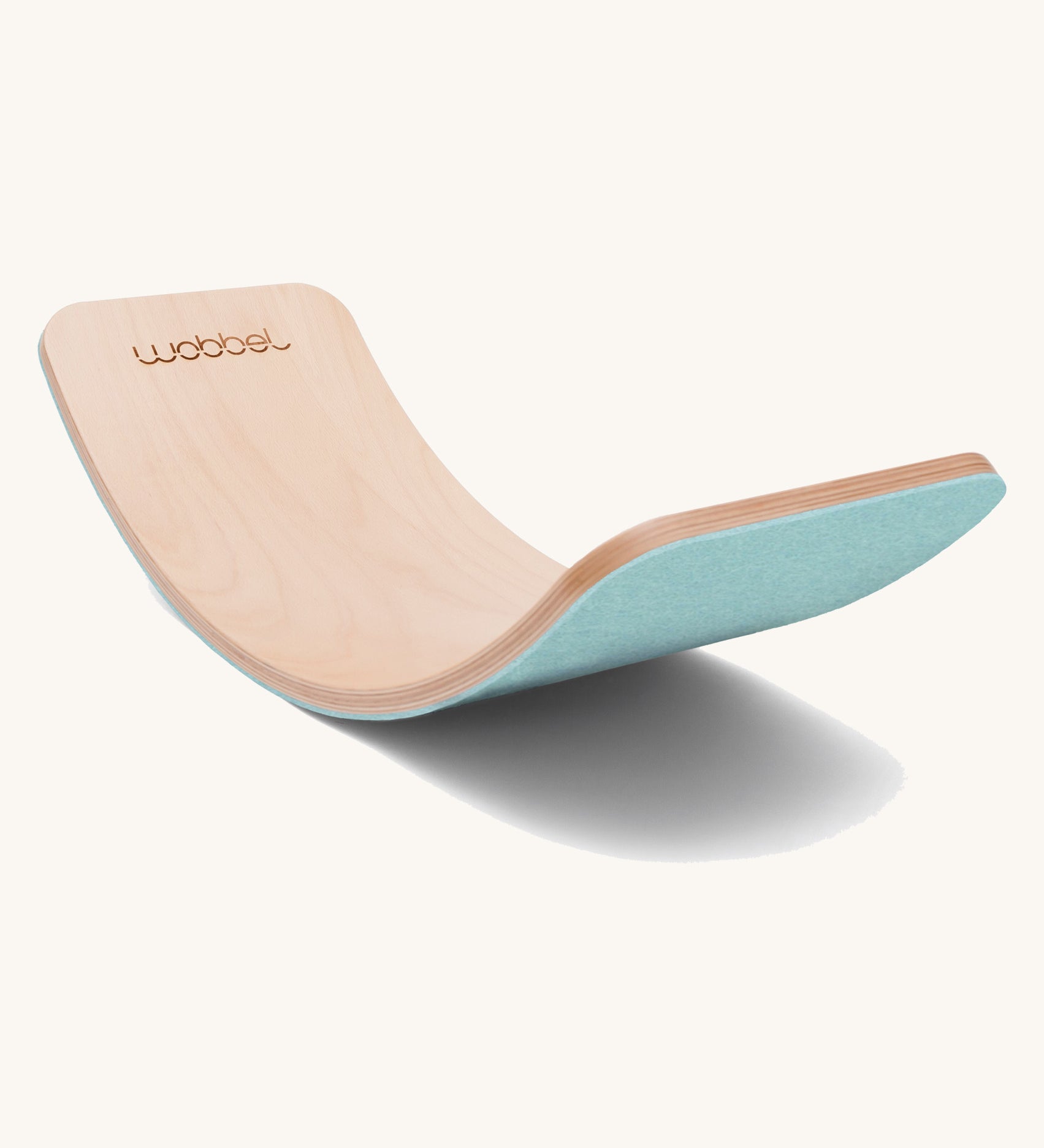 Wobbel Original beech balance board with sky blue recycled felt base shown on a plain background.