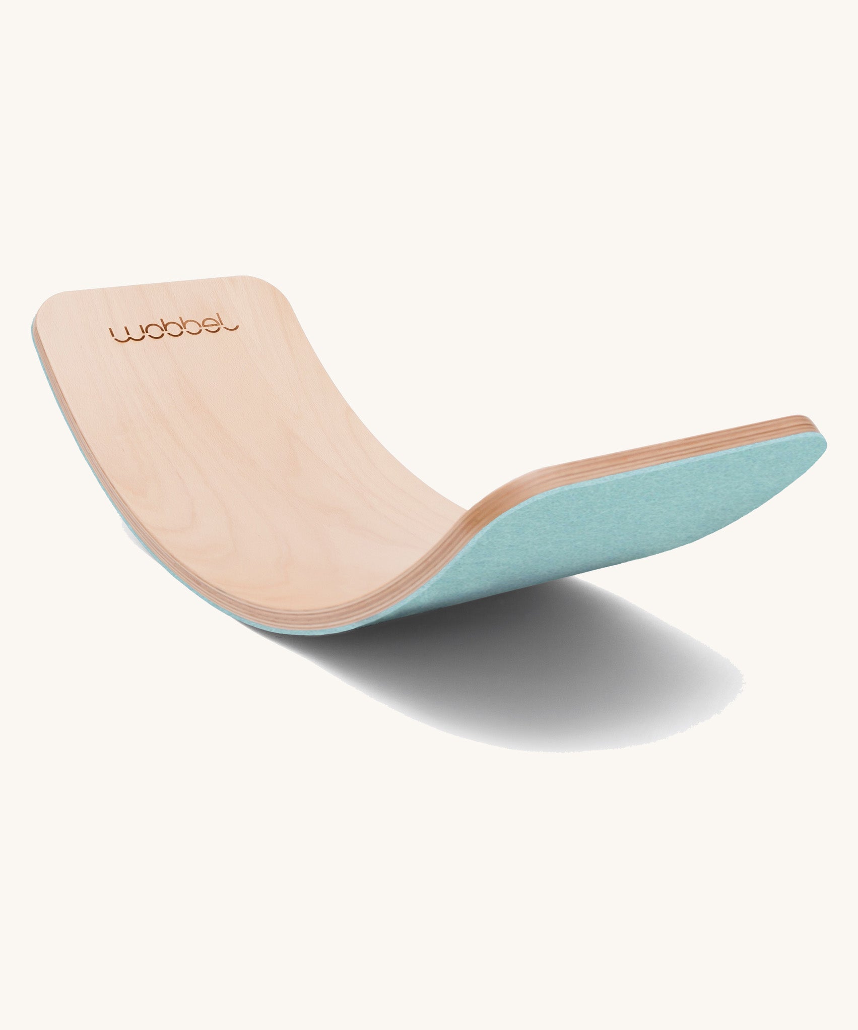 Wobbel Original beech balance board with sky blue recycled felt base shown on a plain background.