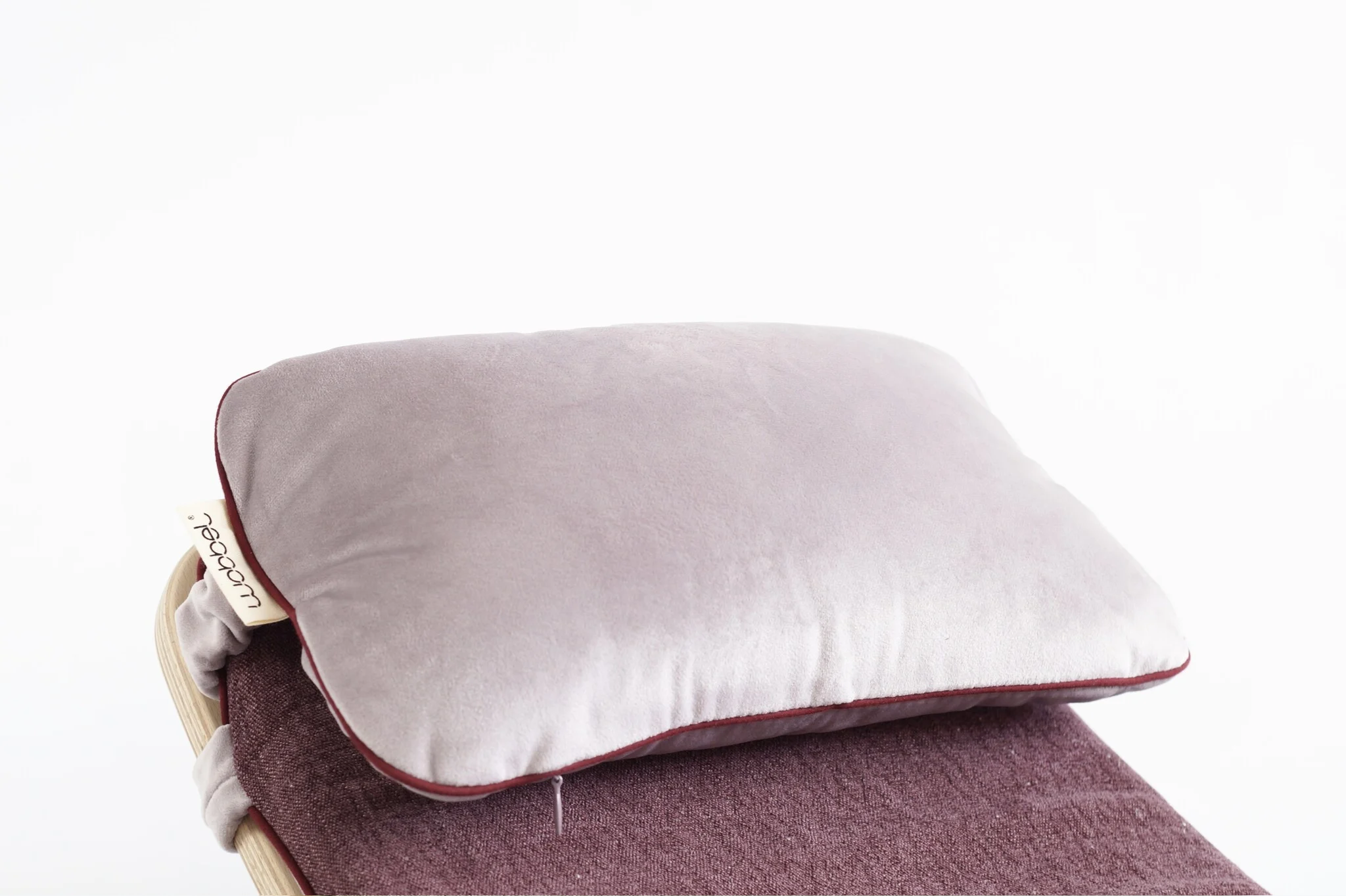 The original Wobbel Board pillow accessory in velvety Amethyst purple.