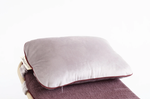 The original Wobbel Board pillow accessory in velvety Amethyst purple.