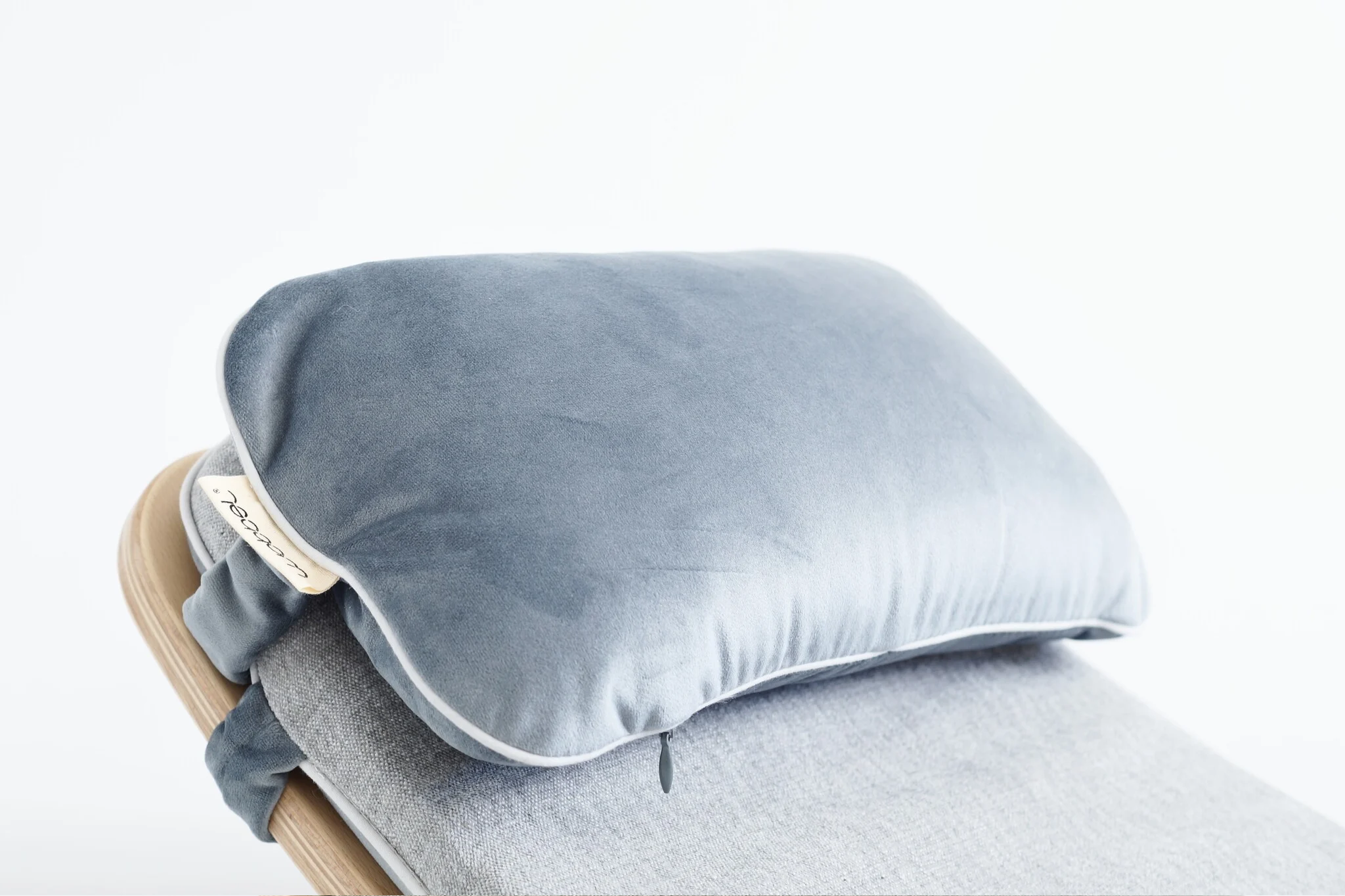 The original Wobbel Board pillow accessory in velvety aquamarine blue