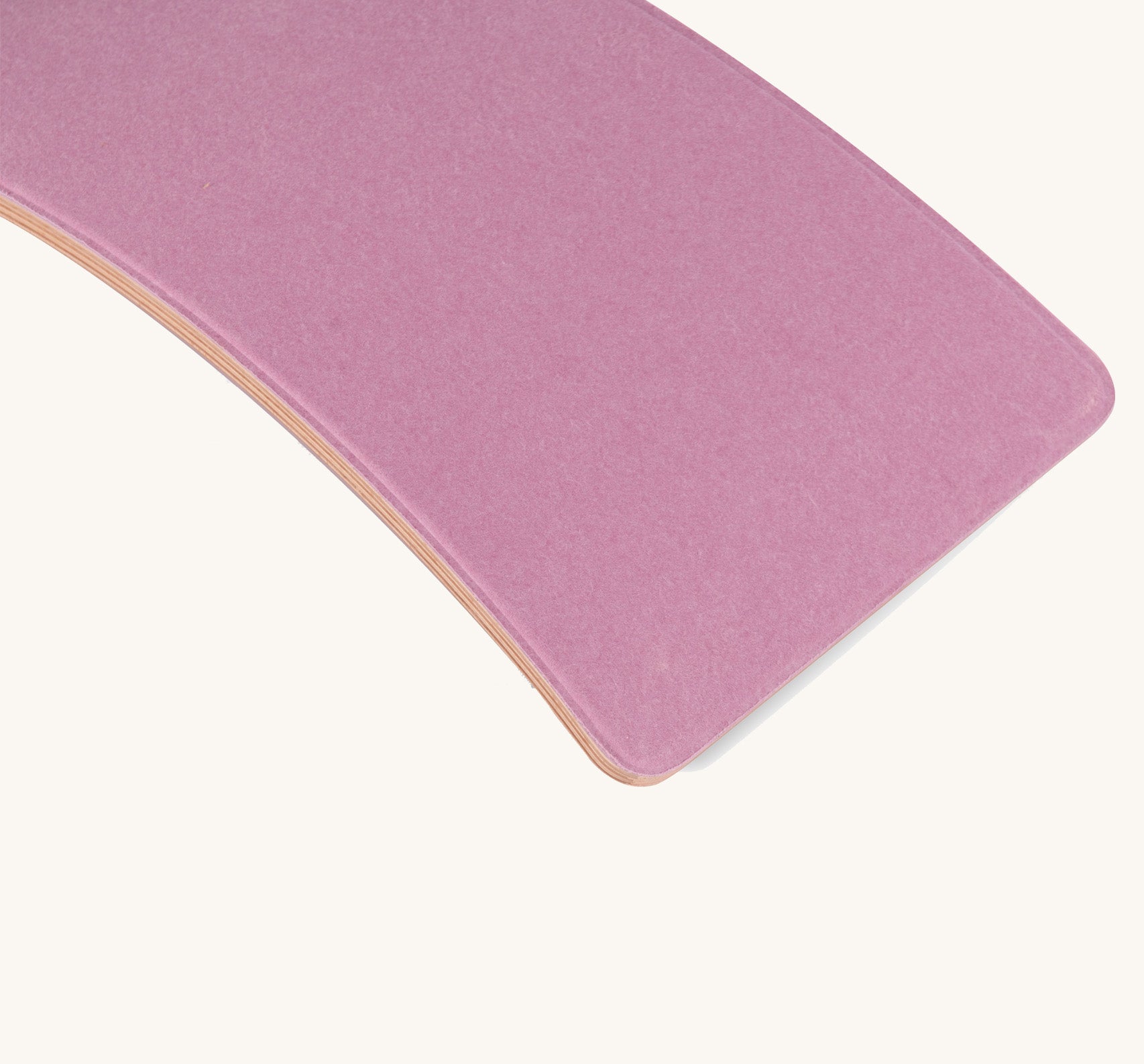 Closeup of the recycled felt backing on the Wobbel Starter Board, in Wild Rose pink.