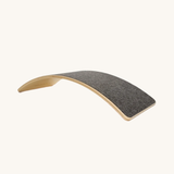 The Wobbel Board Starter, the smallest of the range, with grey felt in a colour called 'Into the Woods'.