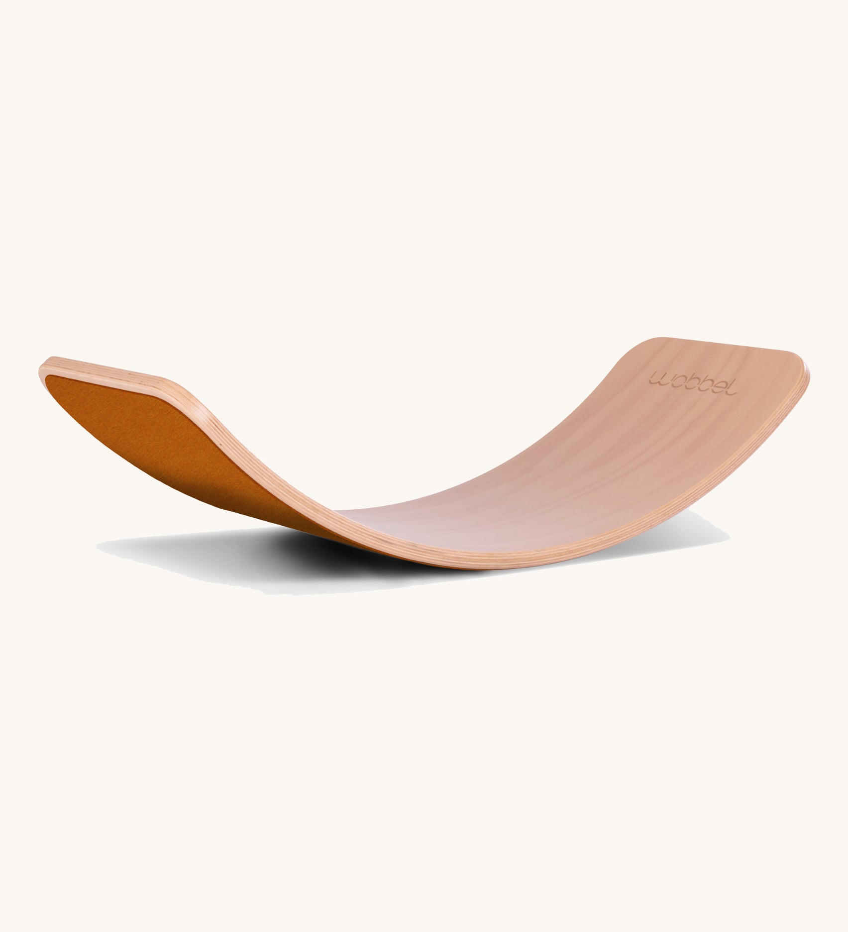 Wobbel Original beech balance board with rust wool felt backing displayed in curved profile.