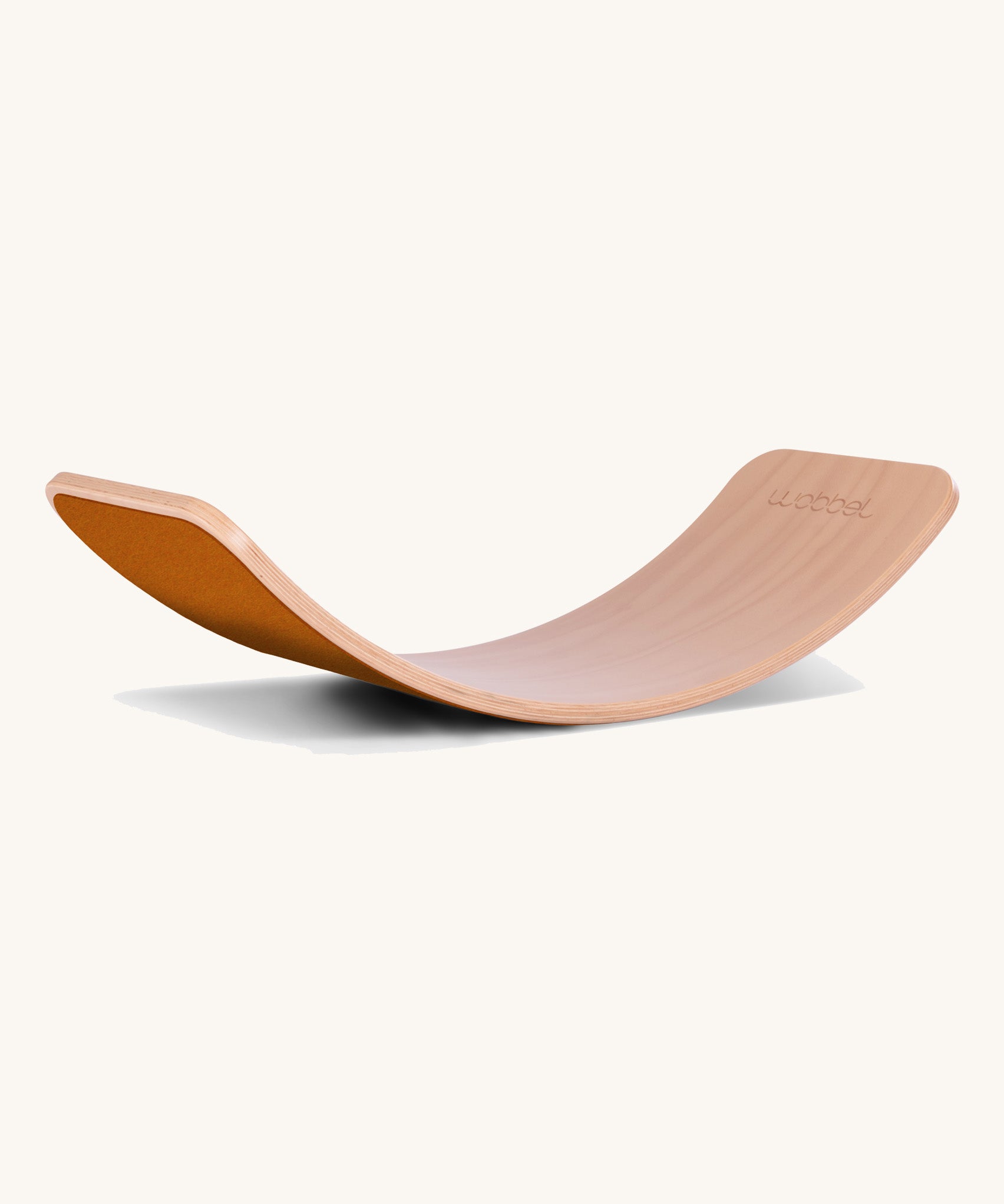 Wobbel Original beech balance board with rust wool felt backing displayed in curved profile.