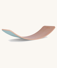 Wobbel XL beech wood balance board with sky blue wool felt backing.