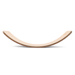 Side view of the Wobbel classic rainbow stripe wooden balance board toy on a white background