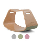 Wobbel wooden Up balance board with a felted bottom on a white background
