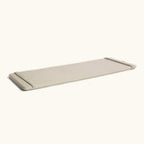 A oatmeal XL Wobbel deck laid flat showing elasticated loops on each end 