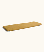 A ochre XL Wobbel deck laid flat showing elasticated loops on each end 