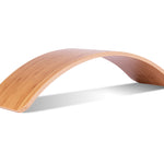Wobbel Original Bamboo without Felt balance board upside down on a white background