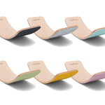 Full range of Wobbel Pro felted balance board laid out in rows on a white background