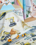 3 small PlanToys construction vehicle toys on the Wondercloths maxi construction site play silk