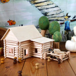 Wondercloths Halloween themed organic cotton play cloth hung up behind wooden toys