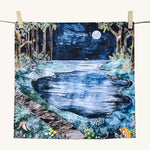 Wonderie Play Cloth featuring the moonlight forest design. Hand illustrated  theme drawings featuring a forest beside a lake underneath a moonlit sky.