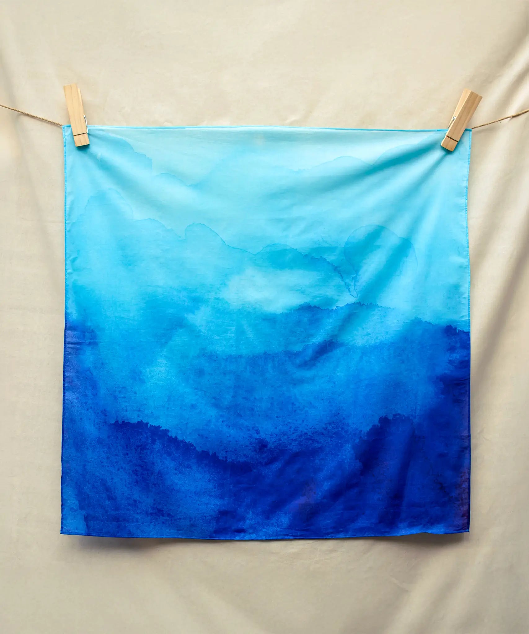 Wonderie organic cotton plain play cloth in azure blue.