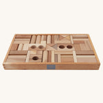 Wooden Story 54 Natural Blocks shown in the wooden tray on a plain background. 