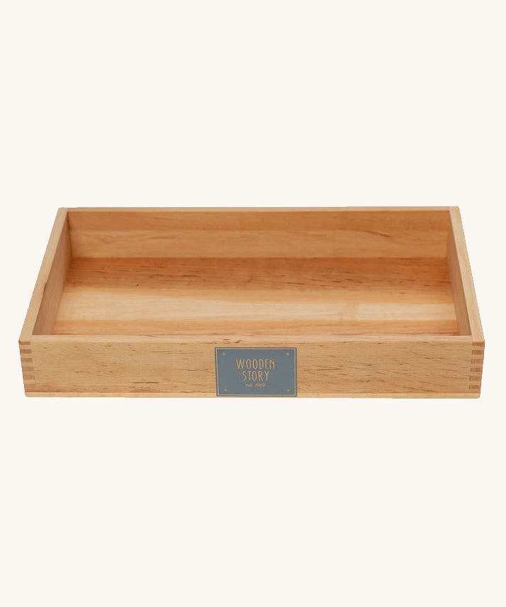 Wooden Story Large Deep Work Tray. The image shows the natural wood grain of the wood, and there is a Wooden Story logo on the front of the tray.