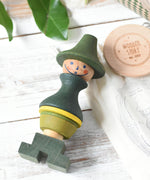 Wooden Story Stacking Toy Stick Figure - No7, a green stacking wooden figure wearing a hat. 