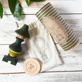 Wooden Story Stacking Toy Stick Figure - No7, a green stacking wooden figure wearing a hat. 