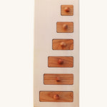 Wooden Story Montessori Long-Short wooden Knob Puzzle Toy. A wooden puzzle including a base frame and 5 rectangular shaped pieces in different lengths with round wooden knobs.  