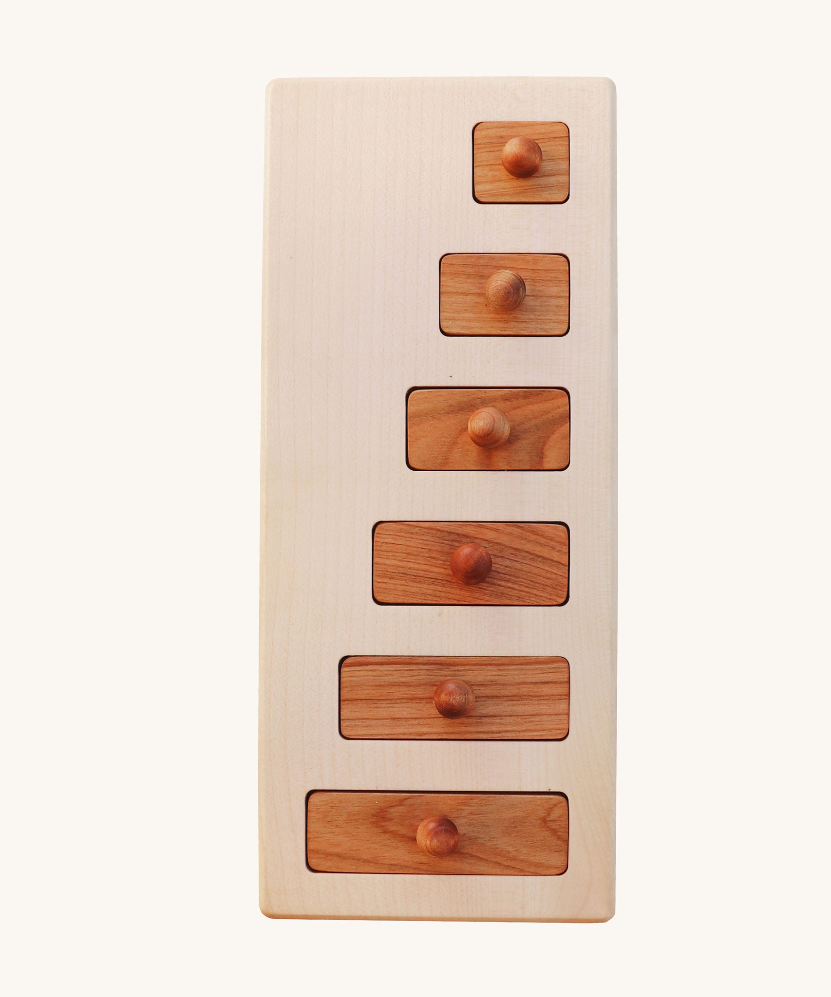 Wooden Story Montessori Long-Short wooden Knob Puzzle Toy. A wooden puzzle including a base frame and 5 rectangular shaped pieces in different lengths with round wooden knobs.  