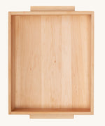 An overhead view of the tray from the Wooden Story Montessori Sand Tray set shown on a plain background.
