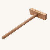 The smoothing tool from the Wooden Story Montessori Sand Tray set shown on a plain background.