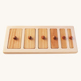 The Wooden Story Montessori Wide-Thin Knob Puzzle. A puzzle with 5 rectangular shaped pieces that fit into a wooden frame.