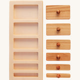 The Wooden Story Montessori Wide-Thin Knob Puzzle. A puzzle with 5 rectangular shaped pieces that fit into a wooden frame.