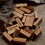 A close up of some Wooden Story natural wooden blocks. 