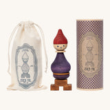 Wooden Story Stacking Toy Stick Figure - No6 next to its cotton storage bag and decorative cardboard tube. 