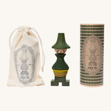 Wooden Story Stacking Toy Stick Figure - No7 next to its cotton storage bag and decorative cardboard tube. 