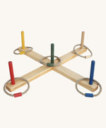 Wooden Story Ring Toss Game with rainbow coloured sticks and rope hoops with co-ordinating coloured connectors. 