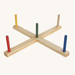 The main frame from the Wooden Story Ring Toss shown set up with the 5 rainbow coloured sticks in place