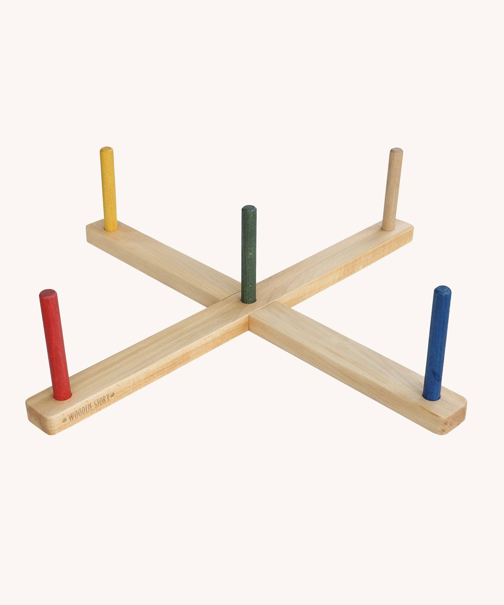 The main frame from the Wooden Story Ring Toss shown set up with the 5 rainbow coloured sticks in place