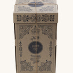 The cardboard gift box that the Wooden Story Rainbow Stacker on a plain background.