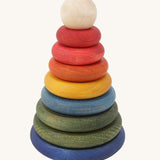 Wooden Story Rainbow Stacker on a plain background. 