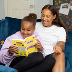 Book from WUKA First Period Pack being read by child