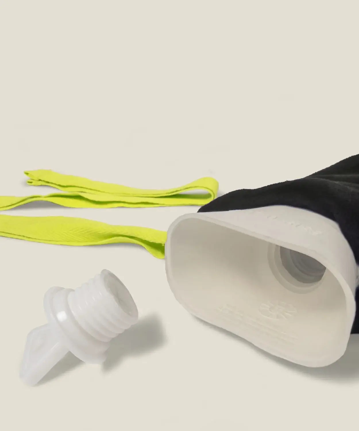 Wuka wearable hot water bottle showing a close up of the cap opened