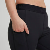 Wuka performance leggings in black showing the elasticated waist band and side pocket
