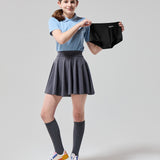 A person holding the WUKA Teen Stretch Boxer Shorts Heavy Flow - Black