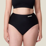 woman wearing the Wuka stretch seamless high waisted period pants 