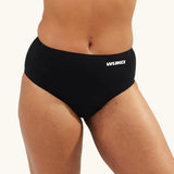Close-up of WUKA Seamless Midi Brief period underwear worn by a model, showing the smooth fabric finish and full coverage designed for leak-proof protection.