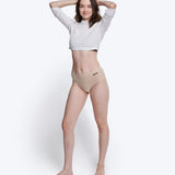 Model wearing the Wuka stretch midi brief period pants in neutral