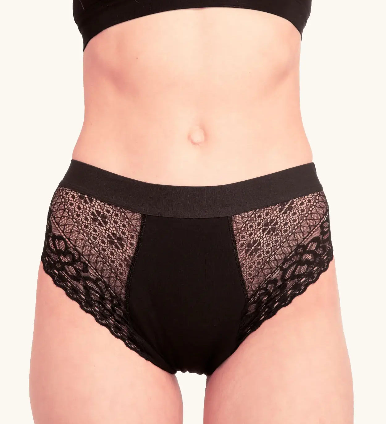 Front of woman wearing the Wuka ultimate lace midi medium flow period pants