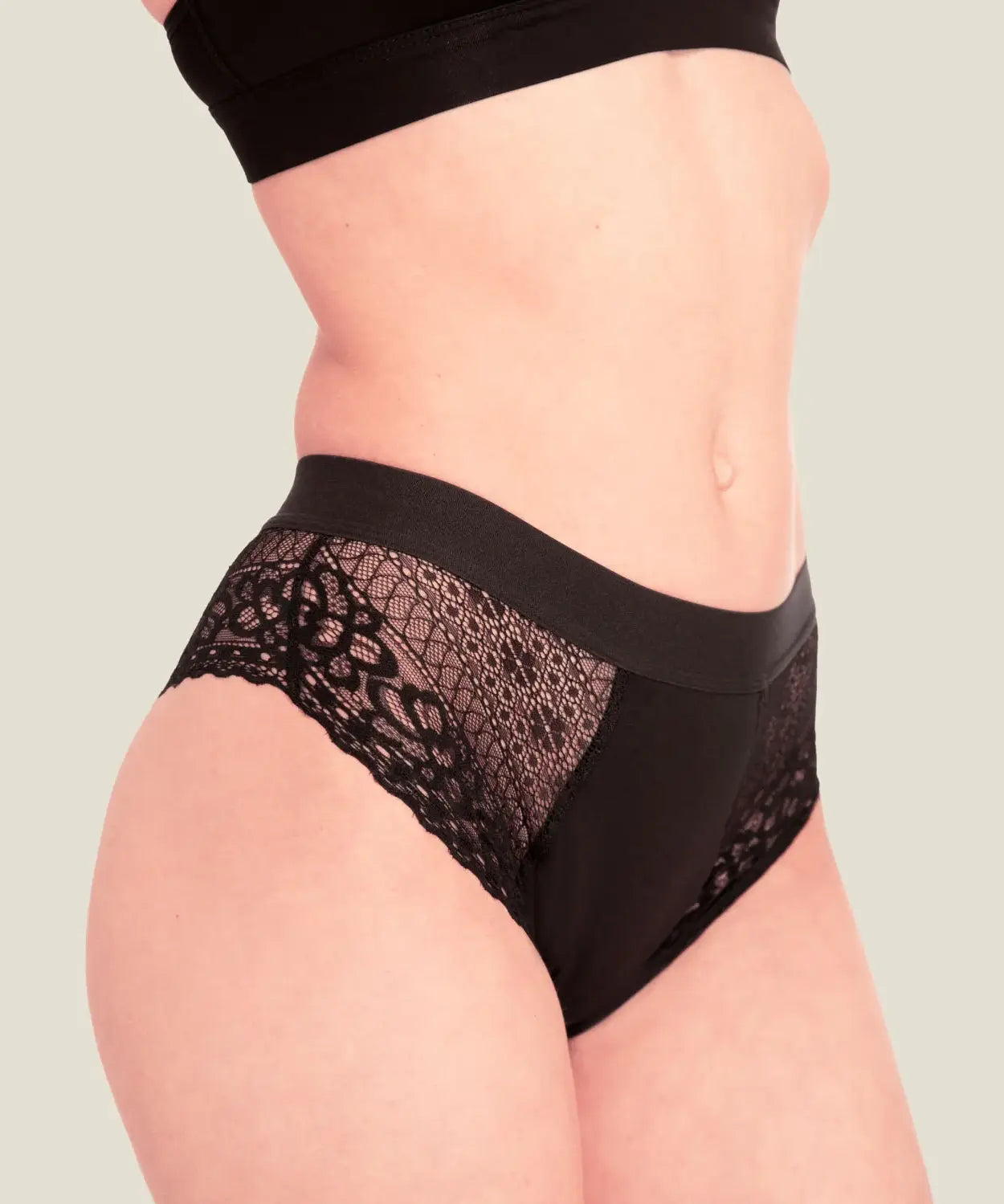 Side of woman wearing the Wuka ultimate lace midi medium flow period pants